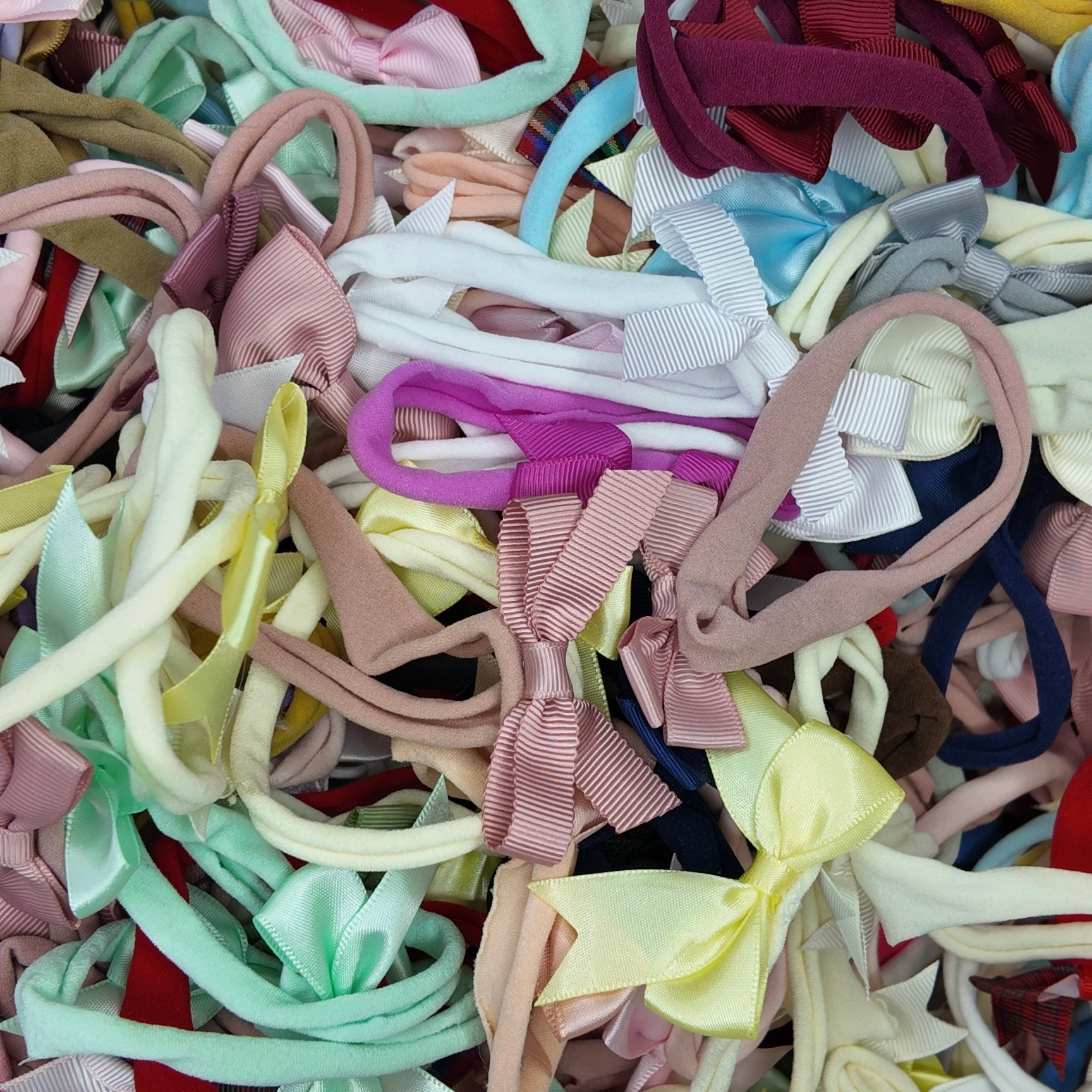 Surprise Bundle of 10 Dainty Baby Bow Headbands For Babies - Image 1