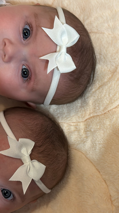 White 2 inch Baby Bow On Headband For Newborn to Age 3 - Image 5