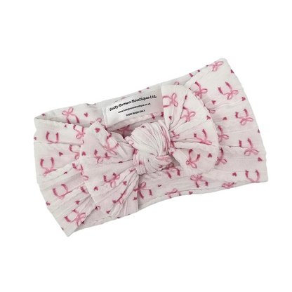 White Bow Print Smaller Bow Headband for Newborns to Age 3  - Image 2