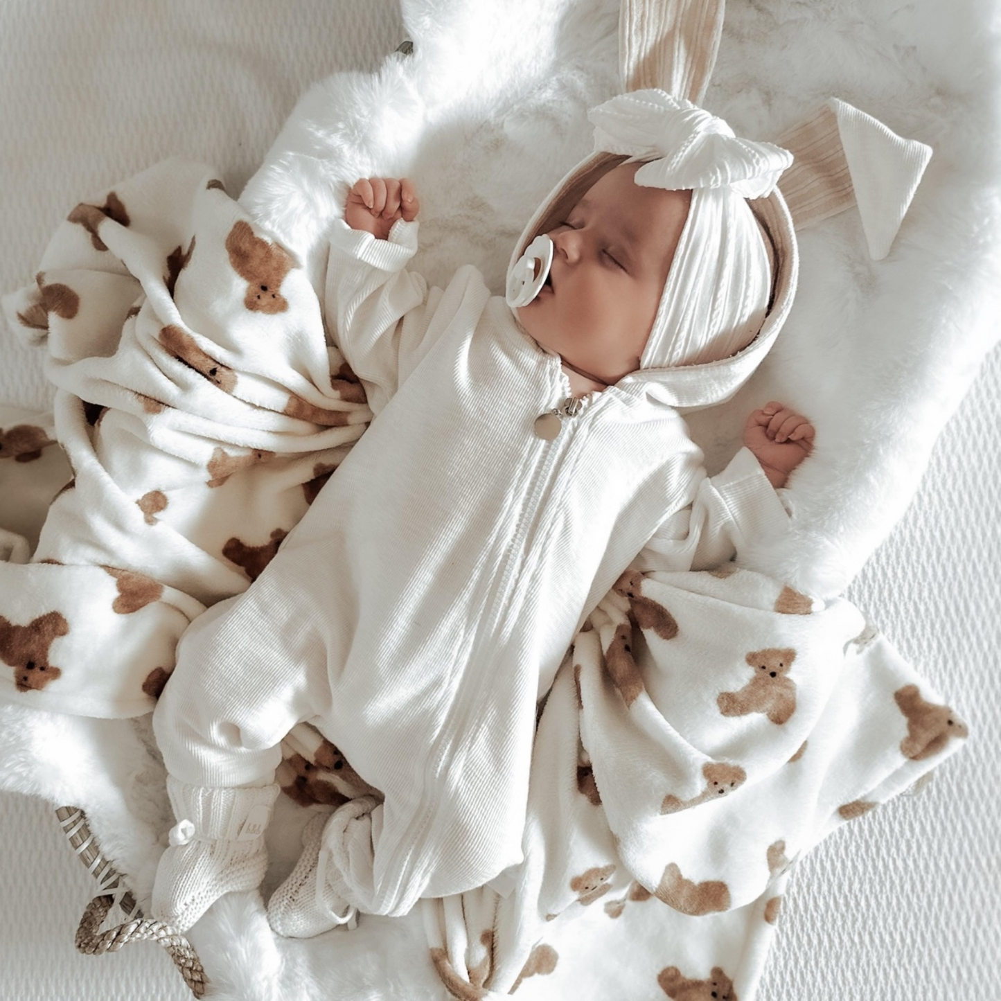 White Larger Bow Headband Designed For Newborn Babies to Age 3 - Image 1
