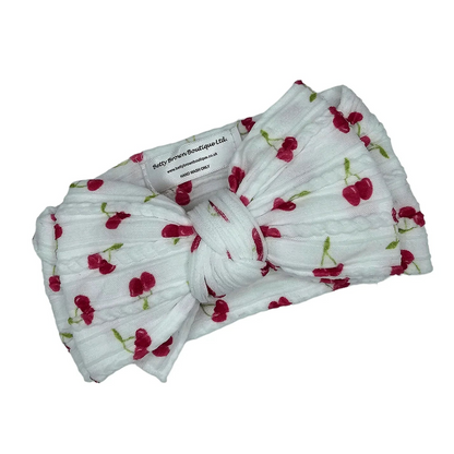 White Cherry Print Larger Bow Headband For Newborns to Age 3 - Image 2