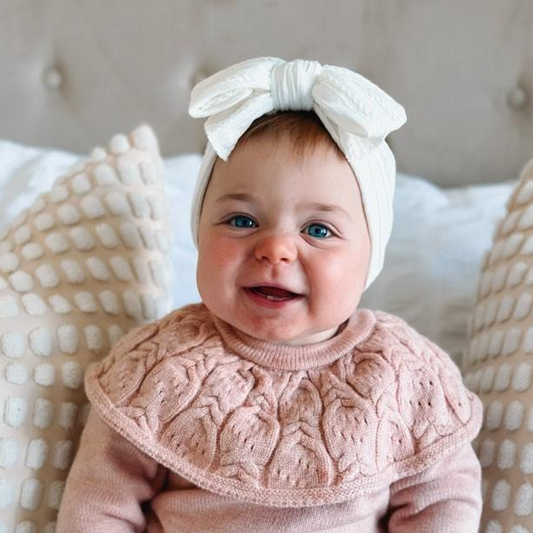 White Larger Bow Headband Designed For Newborn Babies to Age 3 - Image 1