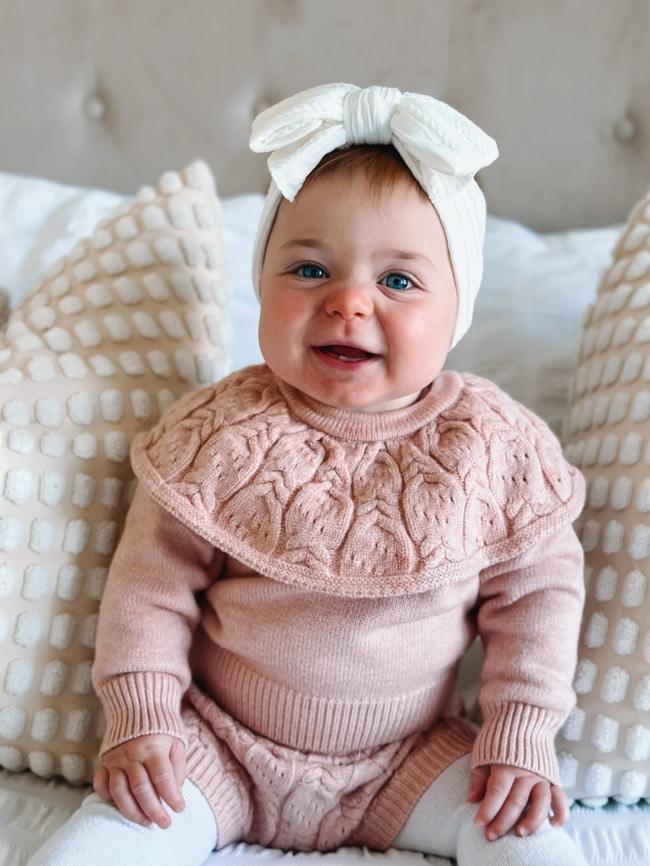 White Larger Bow Headband Designed For Newborn Babies to Age 3 - Image 6