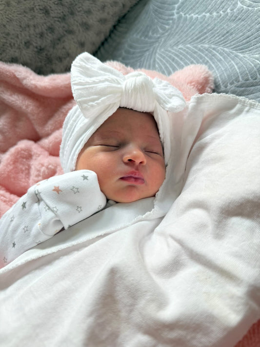 White Smaller Bow Headband Designed For Babies  - Image 1