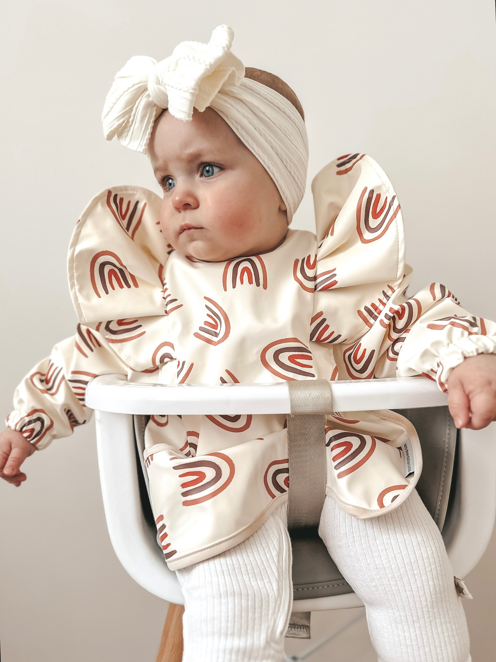 Rainbow Frill Detail Waterproof Bib with Sleeves - Betty Brown Boutique Ltd