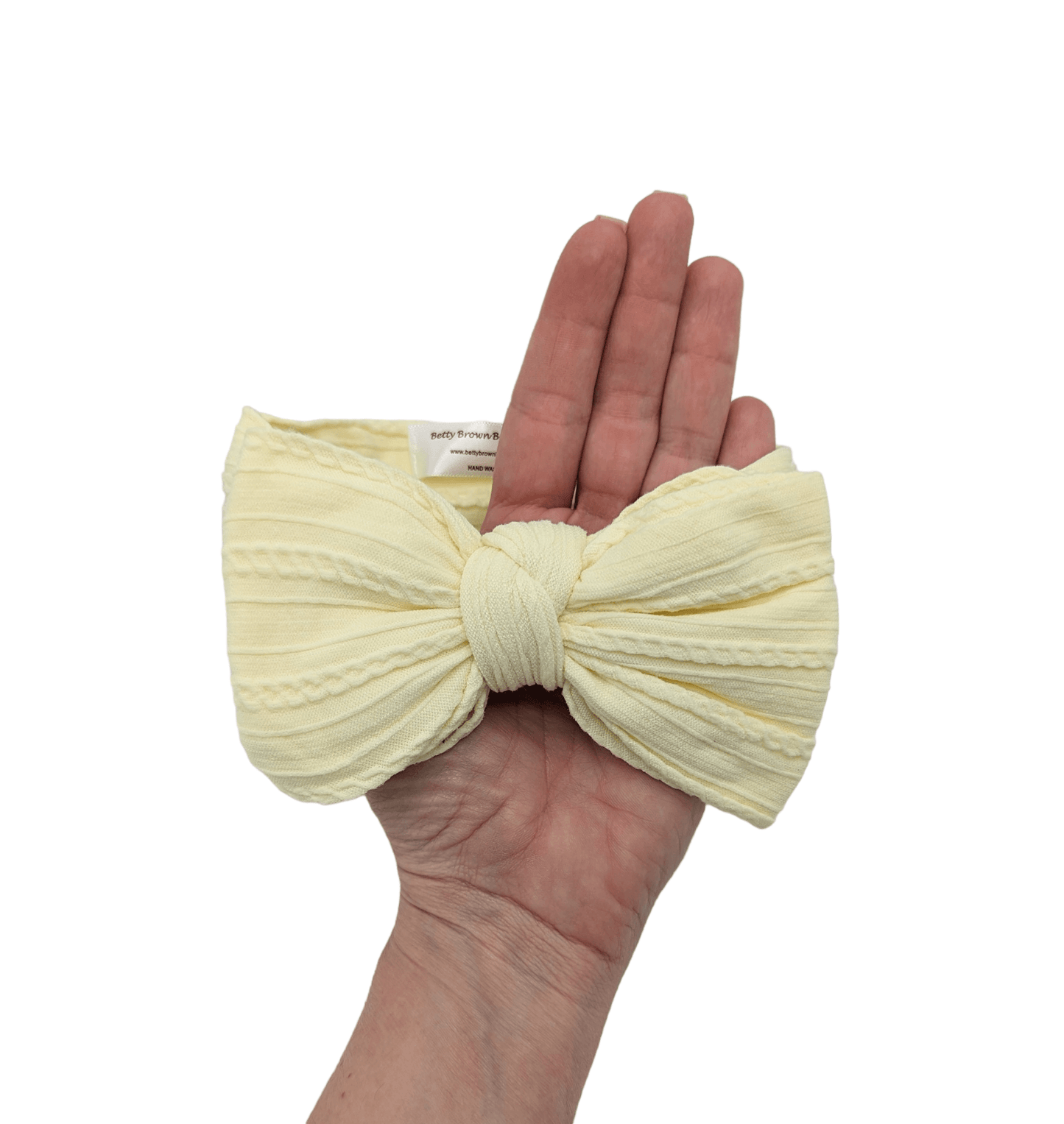 Pale lemon larger bow cable knit headwrap - Betty Brown Boutique Ltd