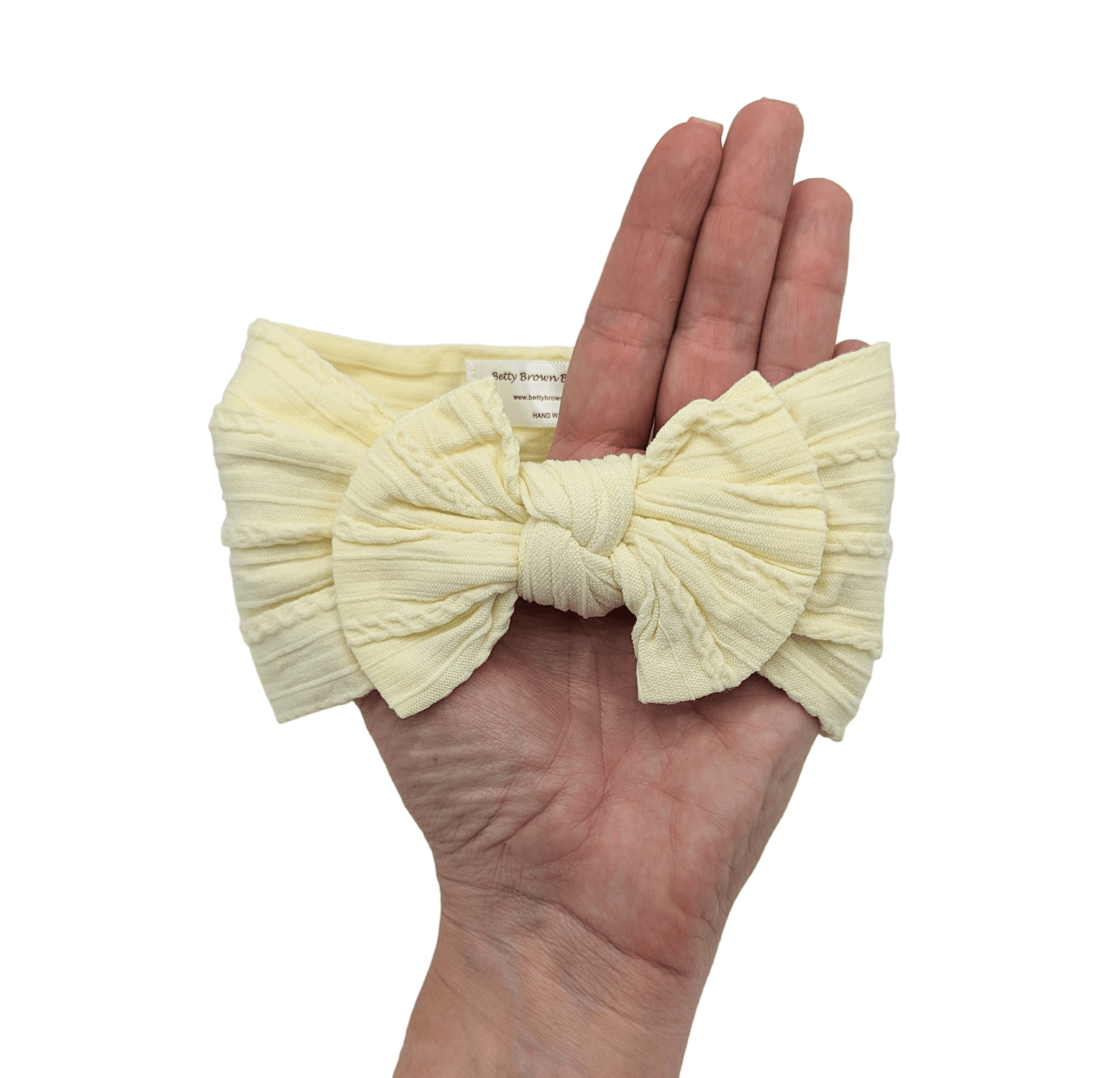 Pale Lemon Smaller Bow Cable Knit Headwrap - Betty Brown Boutique Ltd