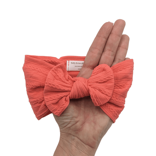 Coral Smaller Bow Headband For Babies From Newborn - Image 1