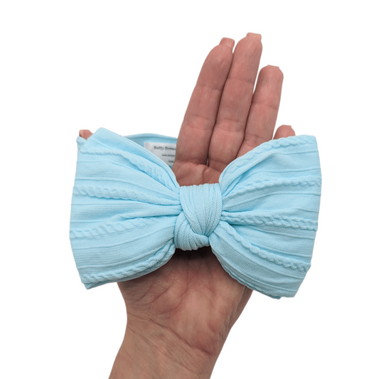 Light Blue Larger Bow Headband Designed For Baby Girls - Image 1